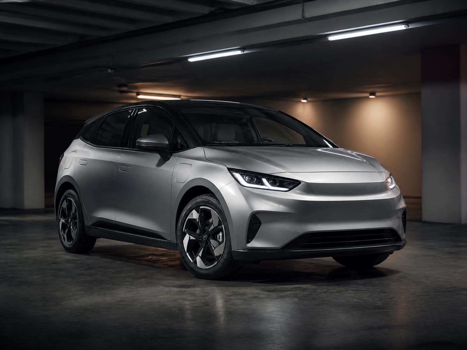 Silver electric hatchback in a clean parking garage
